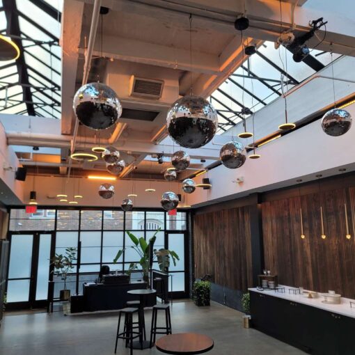 Mirror Balls above the dance floor in the Gallery for a wedding at The Brooklyn Winery, October 31, 2025