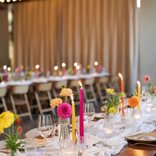 Arden and Keith’s vibrant and colorful Brooklyn wedding at Rule of Thirds, featuring parallel String Lights hanging in The Corner Room overhead.