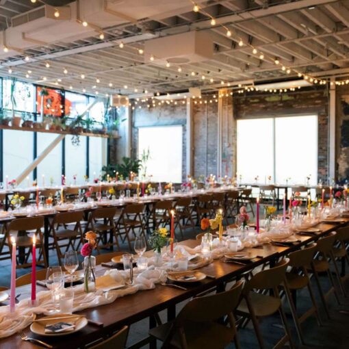 Arden and Keith’s vibrant and colorful Brooklyn wedding at Rule of Thirds, featuring parallel String Lights hanging in The Corner Room overhead.