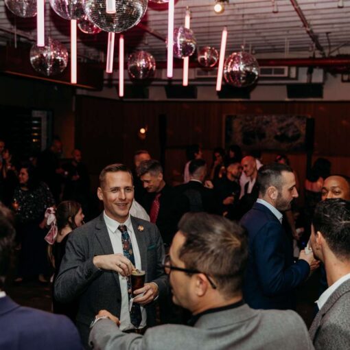 Bryan and Chris utilized Fuchsia LED tubes and Mirror Balls hanging directly above the dance floor in The Main Restaurant at Rule of Thirds Bryan and Chris utilized Fuchsia LED tubes and Mirror Balls hanging directly above the dance floor in The Main Restaurant at Rule of Thirds