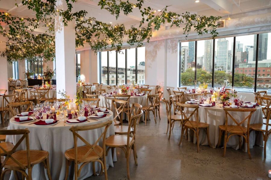Sting Lights with greenery hanging inside the 3rd floor reception room at Rebecca and Xuerui at The Bordone in Long Island City, NYC.