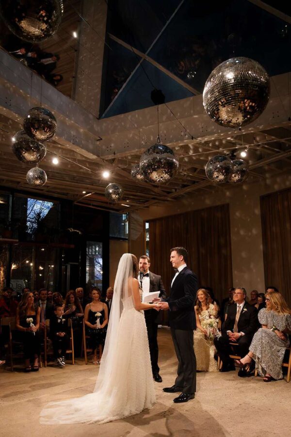 Jessica and Jay's wedding at Rule of Thirds on New Year's Eve with mirror balls.