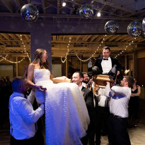 Jessica and Jay's wedding at Rule of Thirds on New Year's Eve with mirror balls and string lights.