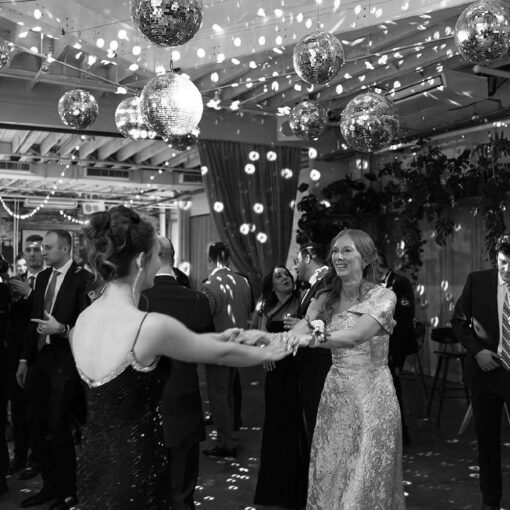 Jessica and Jay's wedding at Rule of Thirds on New Year's Eve with mirror balls and string lights.