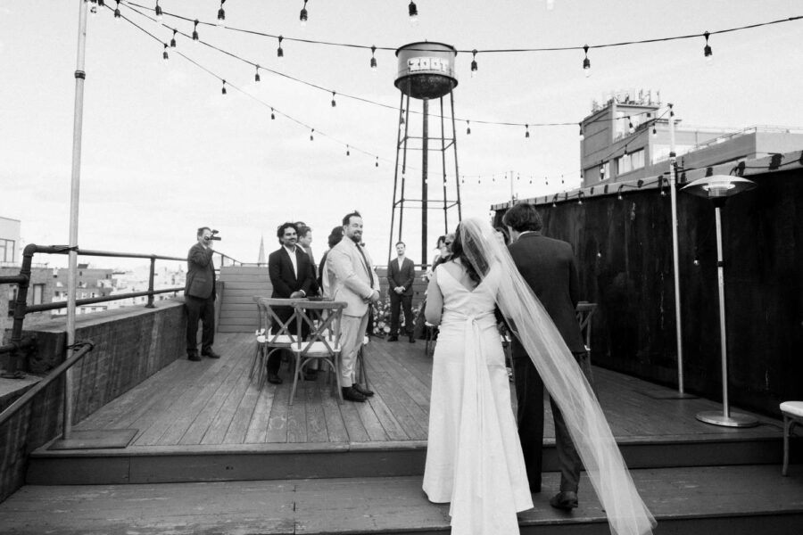 A rooftop wedding ceremony for Meg & Patrick at The Greenpoint Loft.