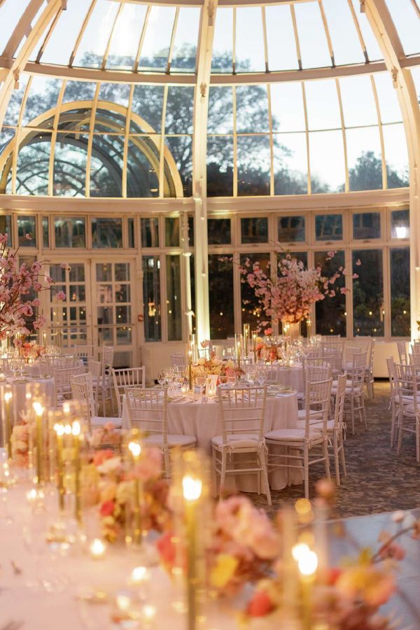 Warm White Up-Lights at the base of each column around the inside perimeter of the Palm House.