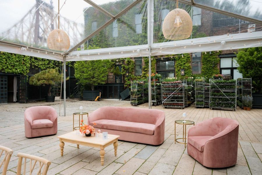 Ace Party Rental set up a clear top tent in the Courtyard at The Foundry. Additionally, Broadway Party Rentals supplied the furniture. Finally, Universal Light and Sound provided the string lights and rattan lanterns.
